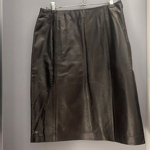Ann Taylor black 100% leather skirt. Side spilt